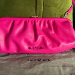 Balenciaga clutch with strap. Like new! Excellent condition and worn with love.